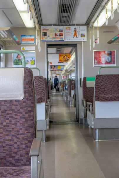 KOBE, JAPAN-NOVEMBER 10, 2018: Empty train seats inside a train — Stock Photo, Image