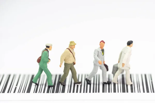 Miniature toys a group of people crossing a road - road safety c — Stock Photo, Image