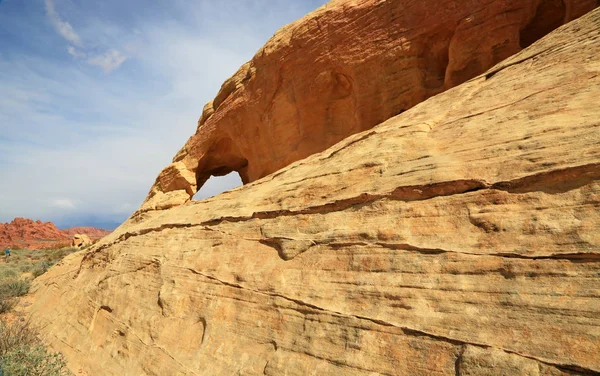 Yellow rock with natural window - Valley of Fire State Park, Nevada