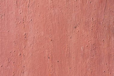 Soluk kırmızı aşınmış boya ile metal doku arka plan