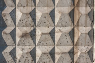 Beton çit duvar doku arka plan gri yükseltilmiş kare desen kirli yüzeyi ile