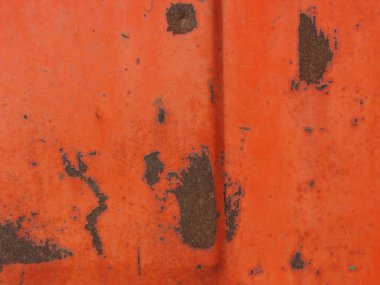 Kırmızı aşınmış boya ve paslı eski noktalar ile metal doku arka plan 