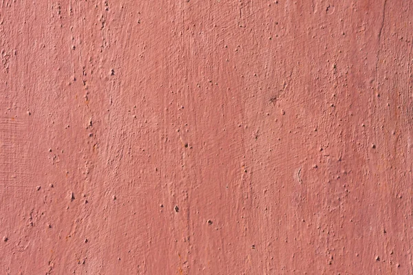 Soluk kırmızı aşınmış boya ile metal doku arka plan