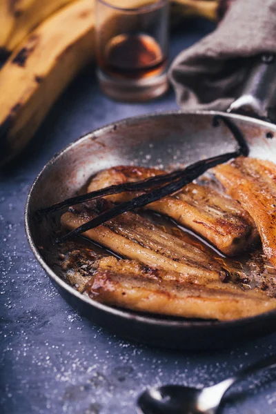 close-up of fried bananas with vanilla, selective focus