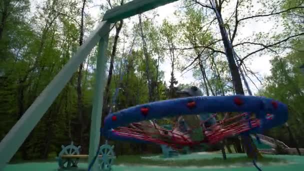 Small Child Boy Gray Pants Turquoise Shirt Gray Cap Riding — Stock Video