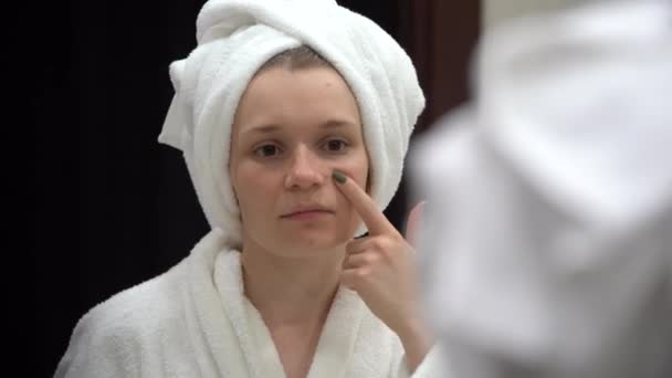 Woman White Terry Robe White Towel Her Head Examines Her — Stock Video