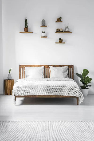 Wooden Frame Double Bed Two Pillows Blanket Small Shelves White — стоковое фото