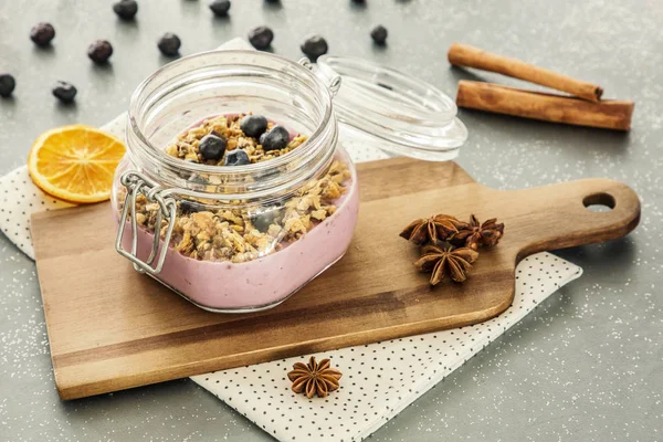 Pink Fruit Yogurt Granola Blueberries Jar Wooden Cutting Board Cinnamon — Stock Photo, Image