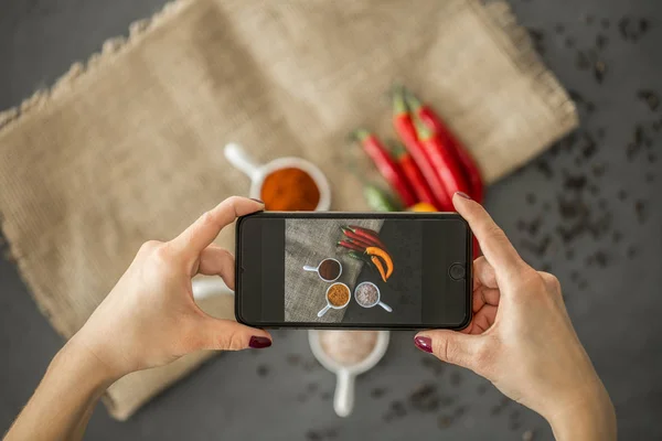 Top View Blogger Taking Photo Spices Stylish Ceramic Dishes Her — Stock Photo, Image