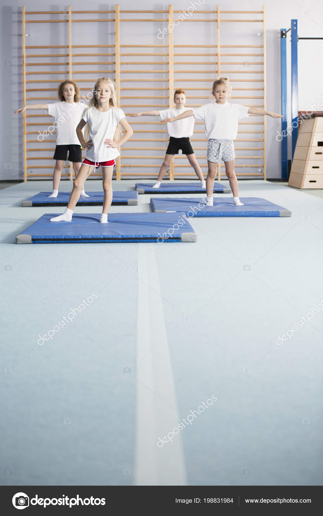 Onwijs School Girls Boys Doing Warm Exercises Modern Gym Hall Interior BI-66