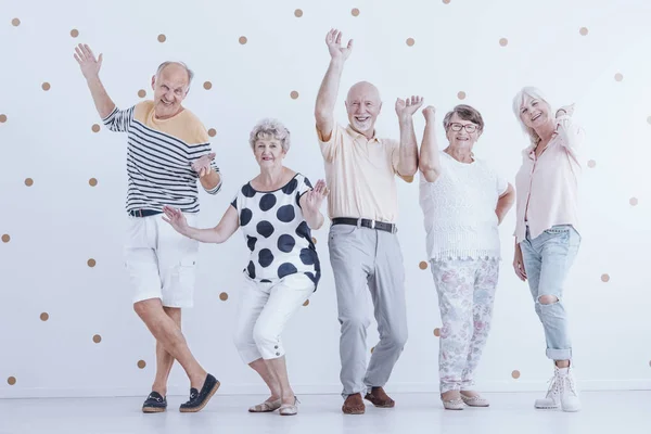 Happy Senior People Dancing White Background Gold Dots — Stock Photo, Image