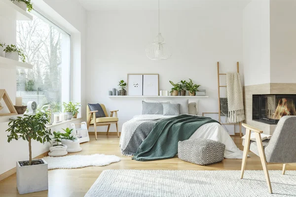 Grey Armchair Patterned Pouf Next Bed Green Blanket Spacious Scandi — Stock Photo, Image