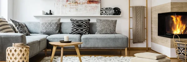 Real Photo Modern Painting Placed Shelf Grey Sofa Patterned Pillows — Stock Photo, Image