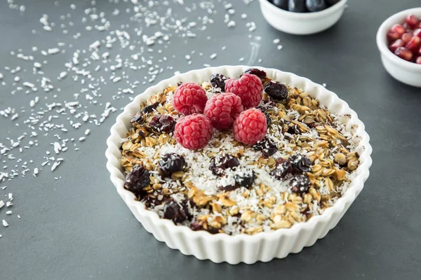 Close Plate Muesli Raisins Raspberries Coconut Shreds — Stock Photo, Image