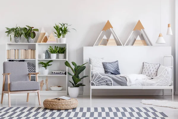 Patterned Armchair Next Pouf Carpet Child Bedroom Interior Plants Bed — стоковое фото