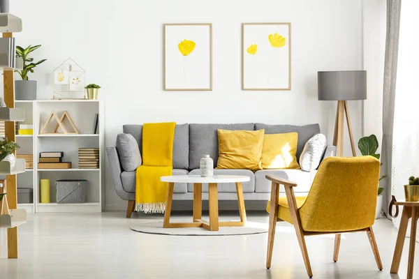 Gele Houten Fauteuil Tafel Woonkamer Interieur Met Posters Boven Grijze — Stockfoto