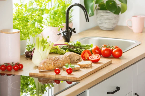 Herbs Bread Tomatoes Cutting Board Next Sink Kitchen Interior — Stock Photo, Image