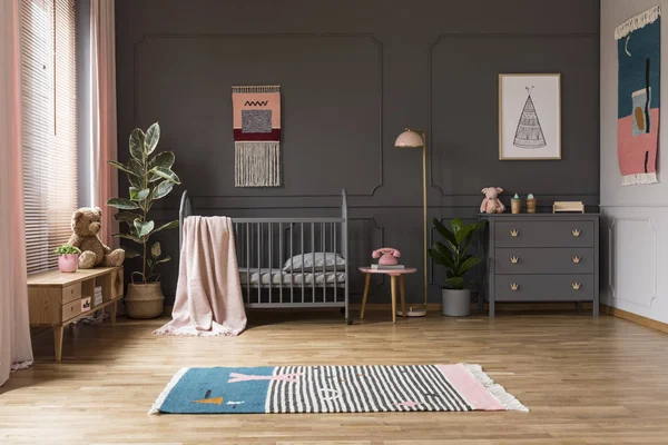 Real Photo Baby Crib Grey Child Room Interior Next Cupboards — стоковое фото
