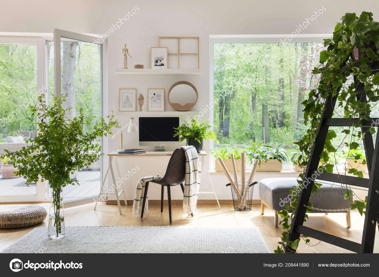 Blanket Chair Next Desk Bright Living Room Interior Windows Plants