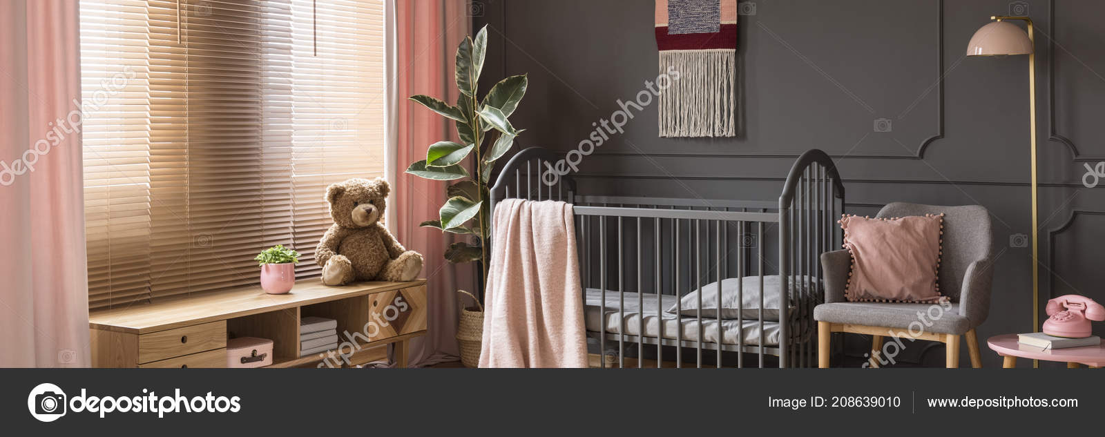 nursery with dark wood furniture