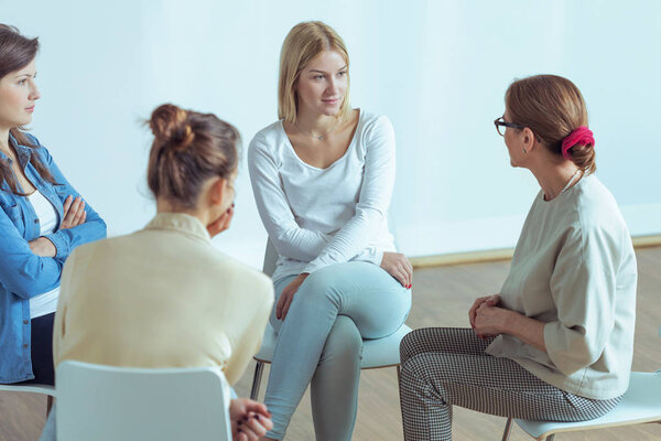 Businesswoman and coach discussing during workshop with brainstorming