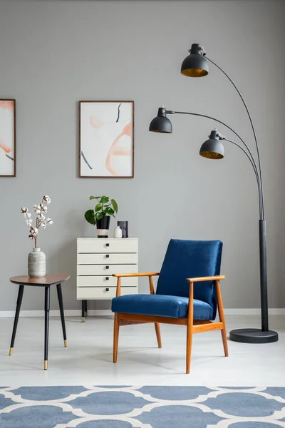 Flowers Wooden Table Next Blue Armchair Lamp Grey Living Room — Stock Photo, Image