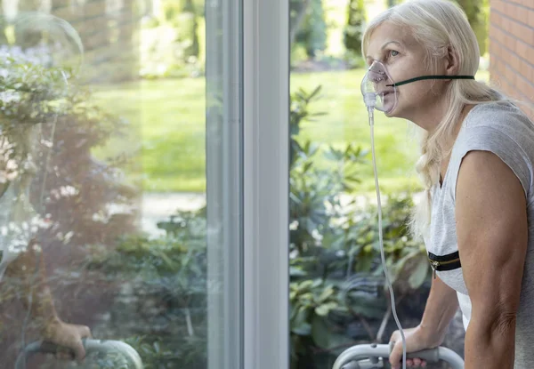 Elder Person Oxygen Breathing Mask Looking Window — Stock Photo, Image