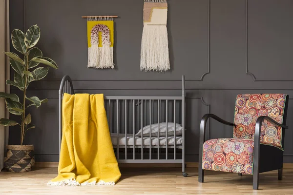Patterned Armchair Next Bed Yellow Blanket Kid Bedroom Interior Focus — стоковое фото