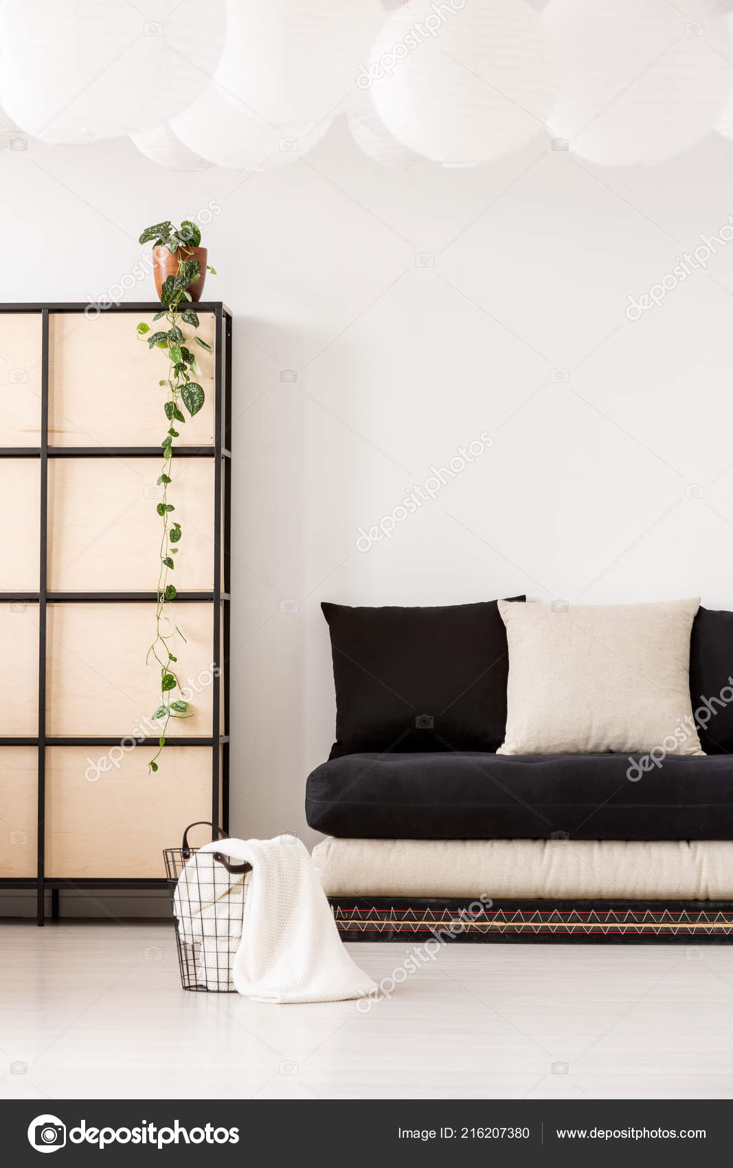 black sofa with pillows