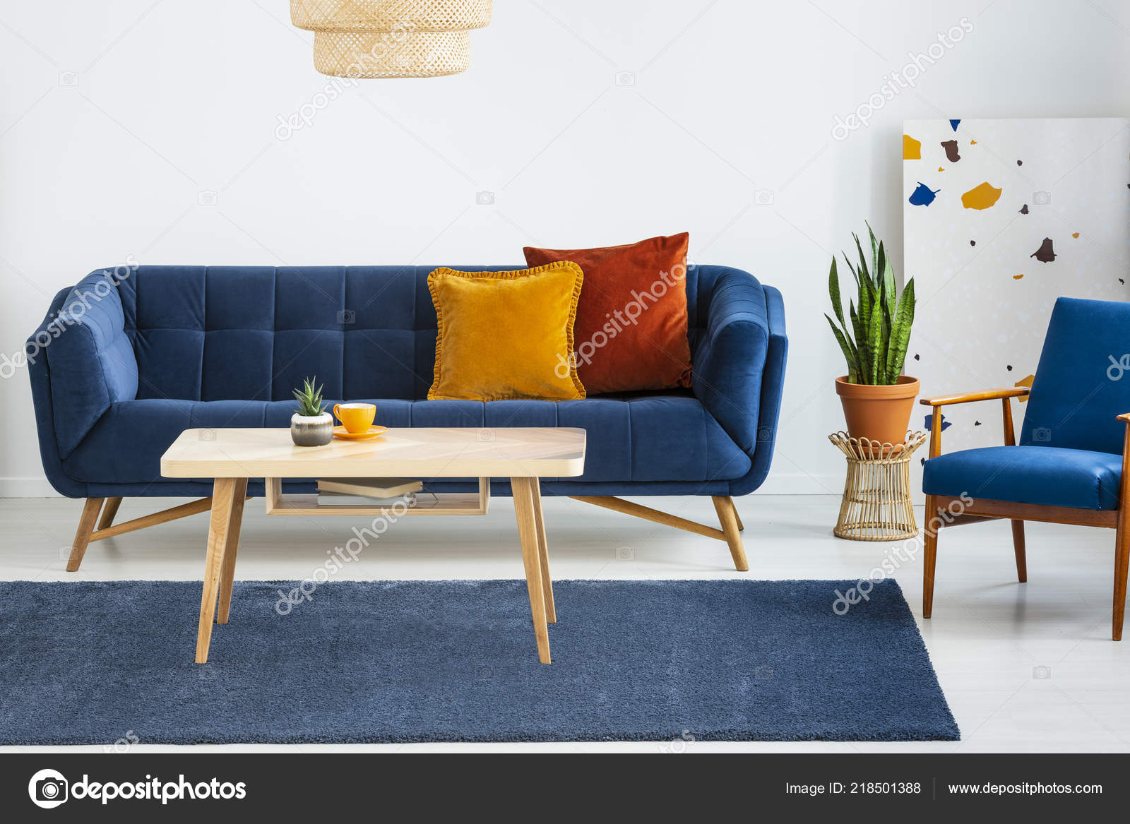 Blue Sofa Cushions Wooden Table 