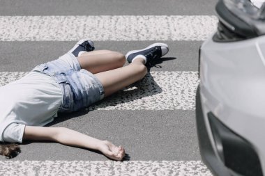 High angle on a child on a crosswalk hit by a car clipart