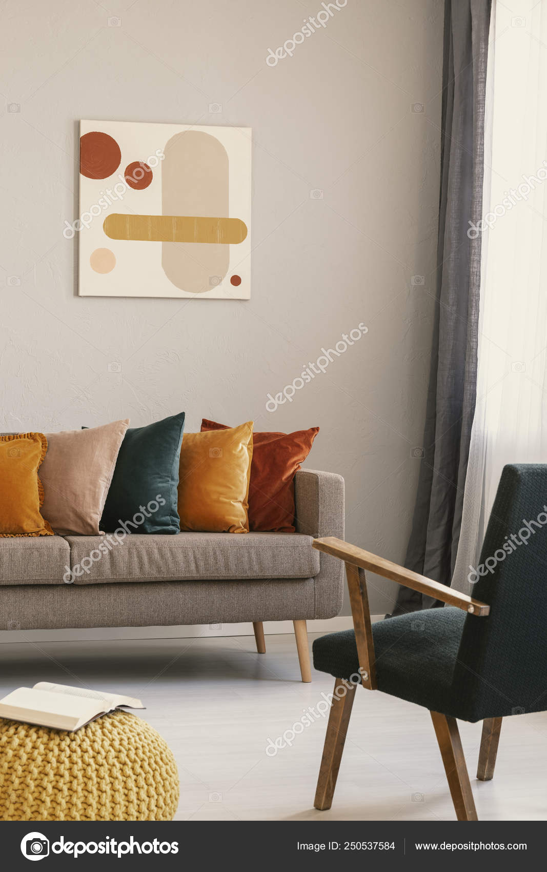 Abstract painting on grey wall of retro living room interior with