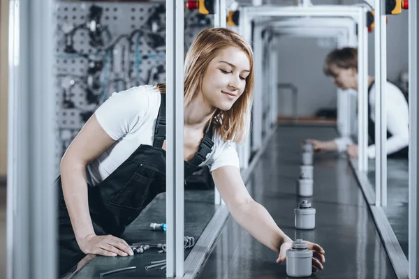 Hardworking focused professional motivated female factory worker — Stock Photo, Image