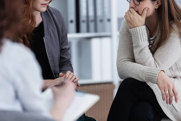 Sad girl with psychotherapist. Women's issues support group concept — Stock Photo, Image
