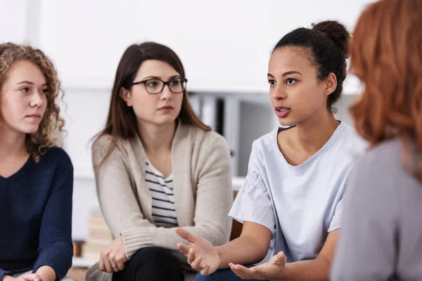 Women supporting each other during psychotherapy group meeting — Stock Photo, Image