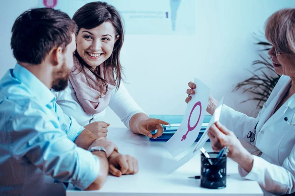 Happy married couple with problem of infertility and during positive doctor visit — Stock Photo, Image