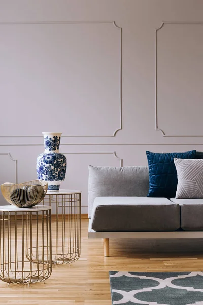 Grey monochrome living room interior with blue accents — Stock Photo, Image