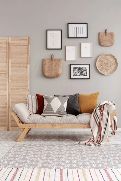 Natural wooden and wicker accessories in contemporary living room interior — Stock Photo, Image