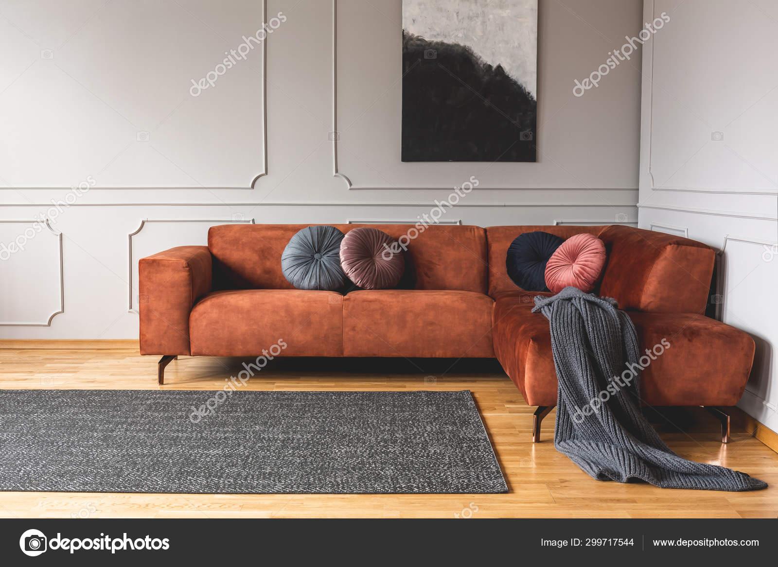 Grey Black Beige And Pink Round Velvet Pillows On Ginger Colored