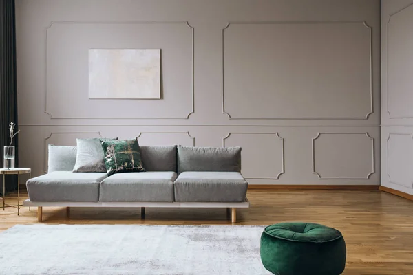 Elegant living room interior with comfortable sofa, real photo — Stock Photo, Image