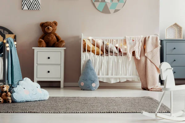 White wooden furniture in pastel scandinavian baby bedroom for twins — Stock Photo, Image