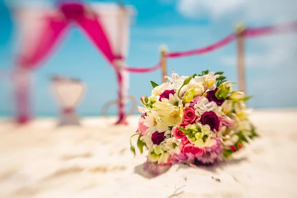 Flowers for caribbean wedding ceremony. Photographed on lens baby