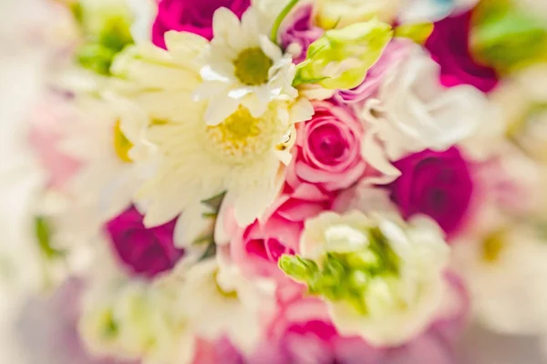 Flowers for caribbean wedding ceremony. Photographed on lens baby
