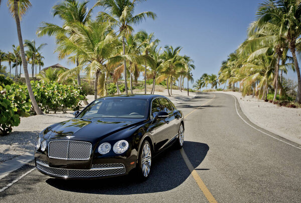 Bentley on the road in tropical climate, Dominican Republic