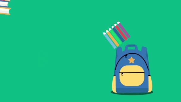 回到学校的概念 背包与学校用品在绿色背景 — 图库视频影像