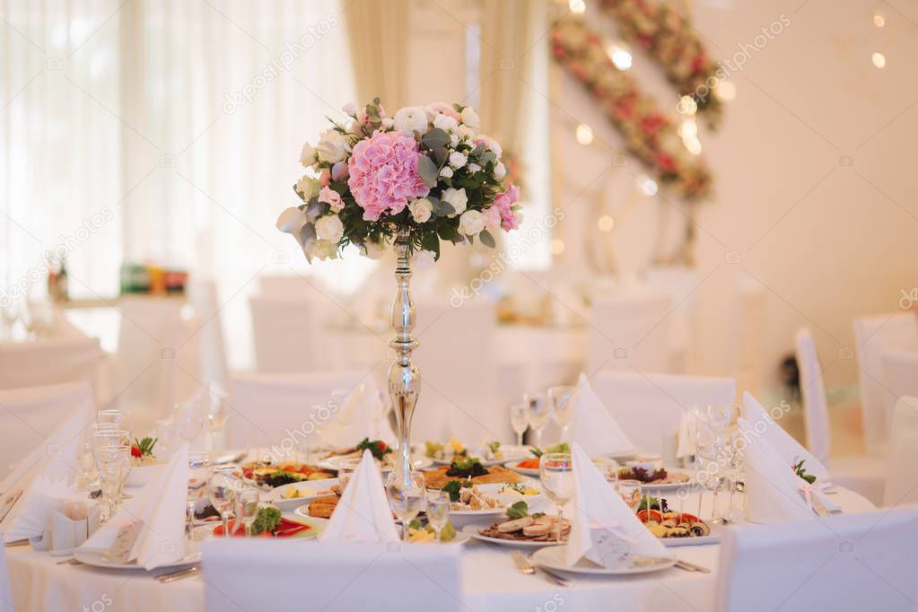 Wedding bouquet in restaurant on the table