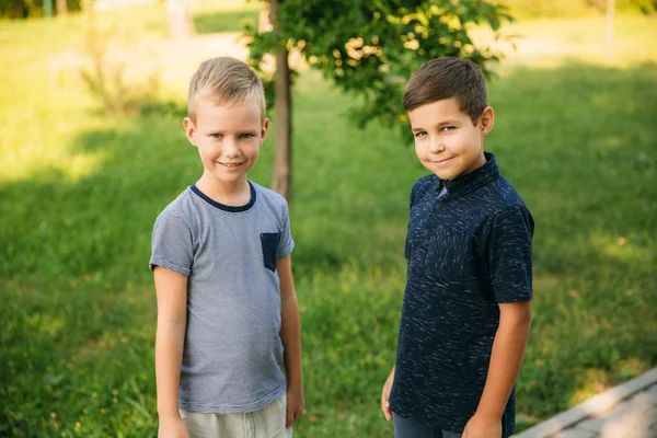 Two boys friends spend time in park. Children models — Stock Photo, Image