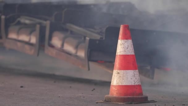 Hot recycling machines running on the road. Smoke around machines — Stock Video