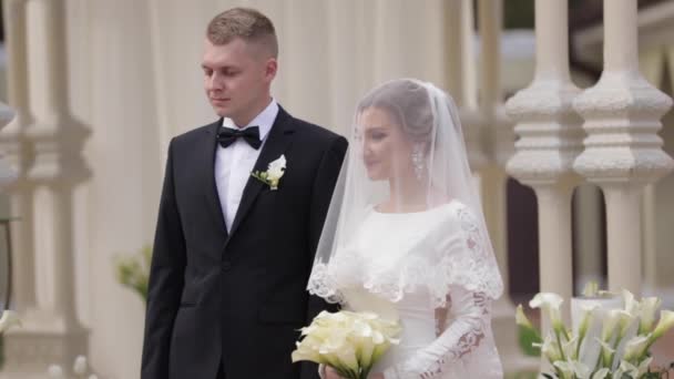 Groom and bride swear to each other for infinite love — Stock Video