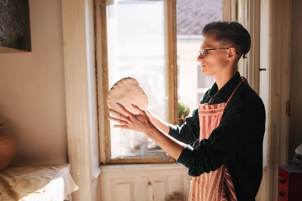 Male potter works with clay. Hands of man creating ceramic product — Stock Photo, Image